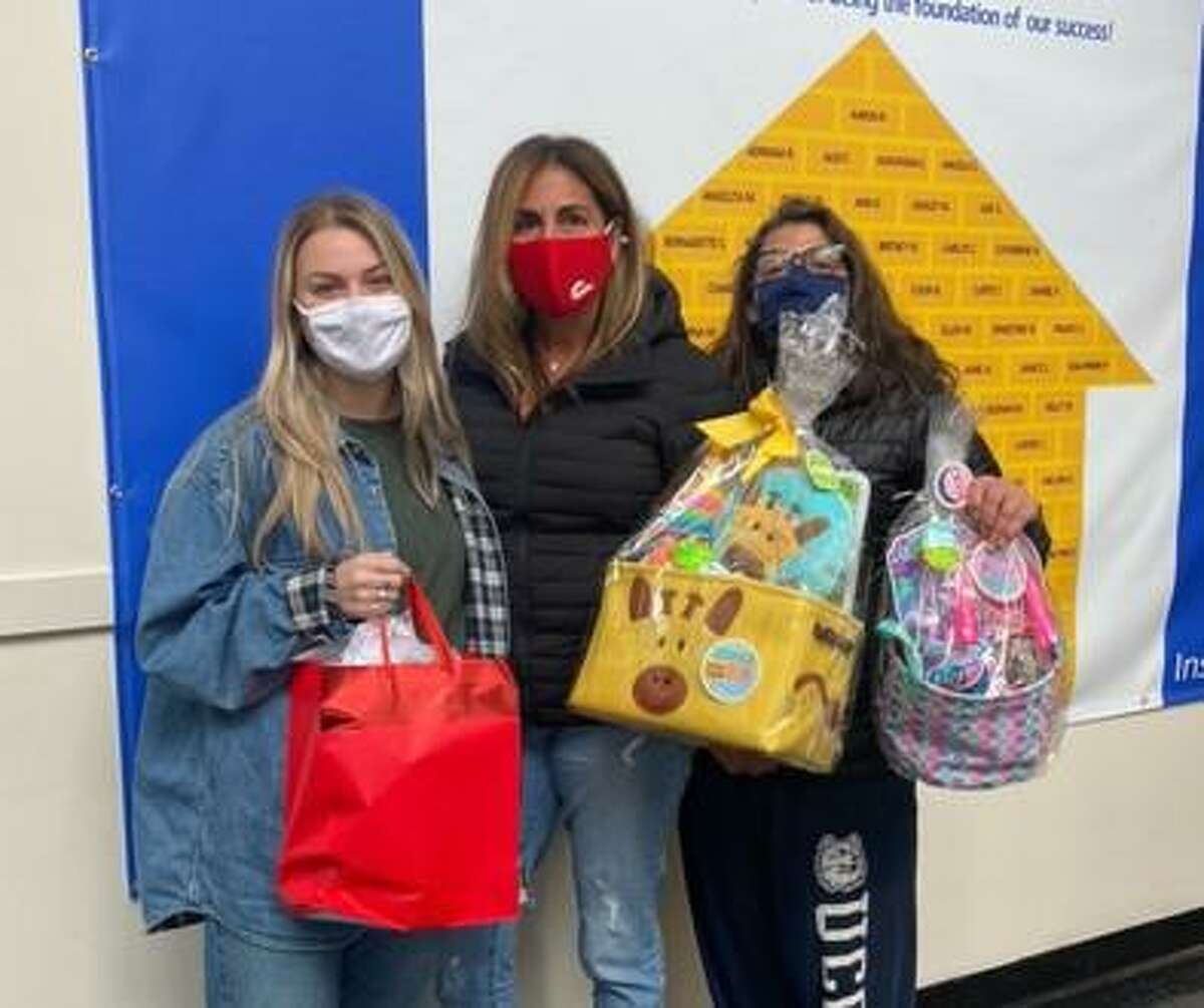 Shelton-based DiMatteo Group Financial Services presented a total of 75 Easter baskets to children at three shelters in lower Fairfield County.