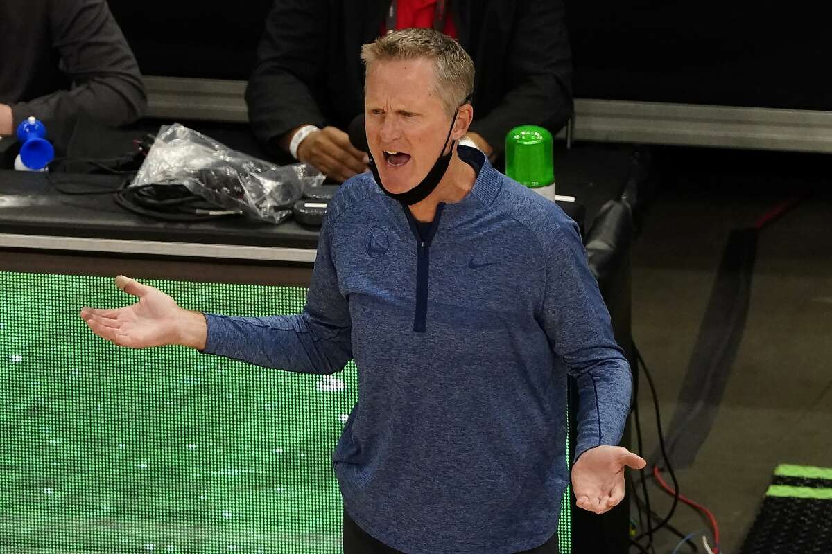 Golden State Warriors head coach Steve Kerr is shown during the second half of an NBA basketball game against the Atlanta Hawks Sunday, April 4, 2021, in Atlanta. (AP Photo/John Bazemore)