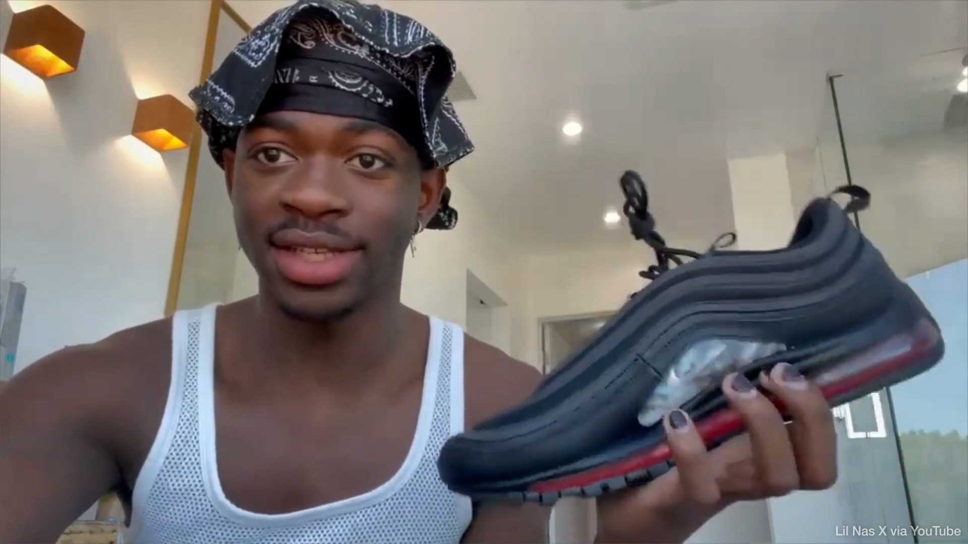 Judge blocks customers from receiving controversial Lil Nas X shoes ...