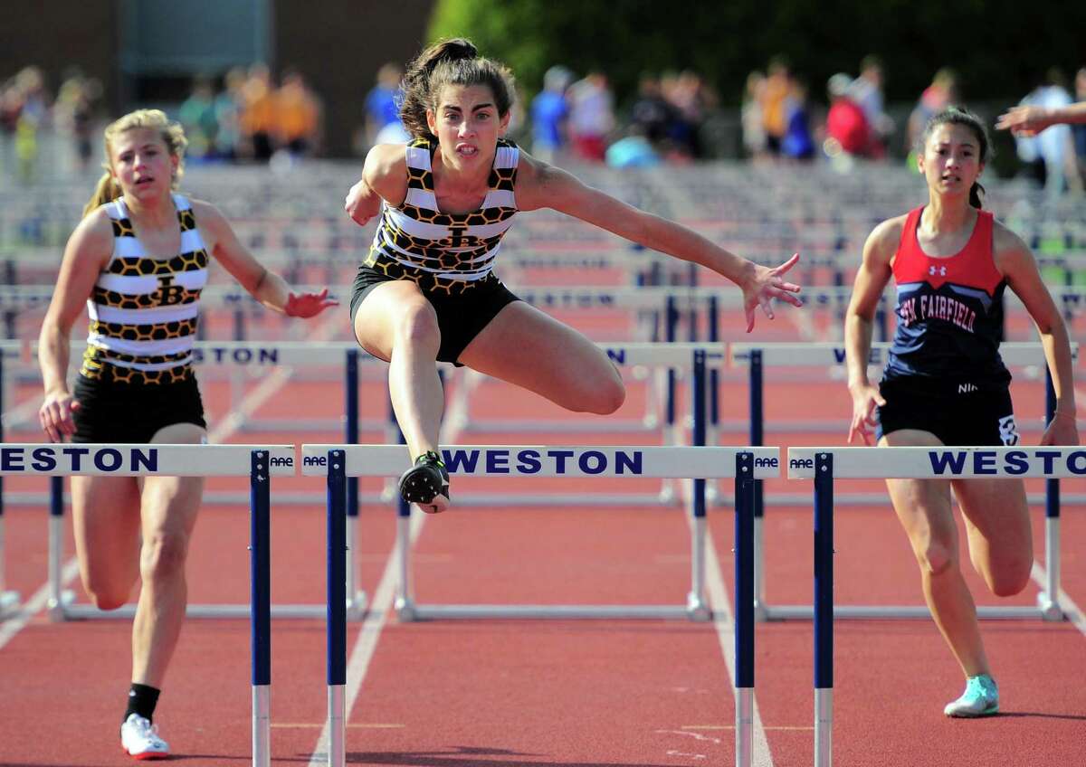 Barlow’s Mariella Schweitzer clears the final hurdle for first place during the SWC meet in 2019.