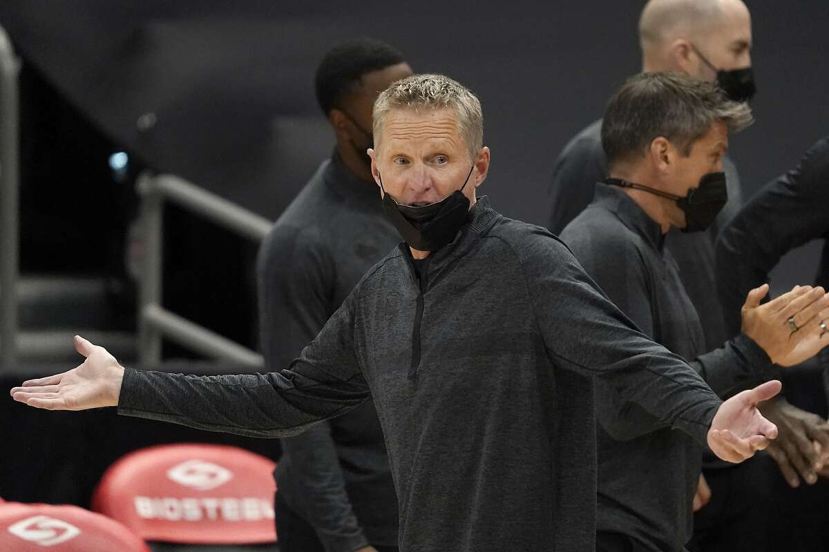 Golden State Warriors head coach Steve Kerr reacts to an official during the second half of an NBA basketball game against the Toronto Raptors Friday, April 2, 2021, in Tampa, Fla. (AP Photo/Chris O'Meara)