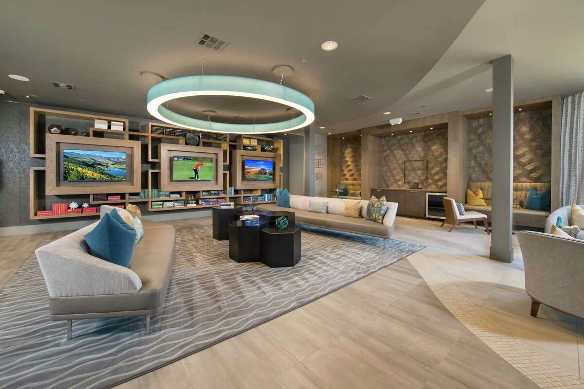 The clubroom is pictured at The Mark at CityPlace Springwoods Village, a development of Martin Fein Interests at 1600 Springwoods Plaza Drive in Spring. CDC Houston acquired the property.
