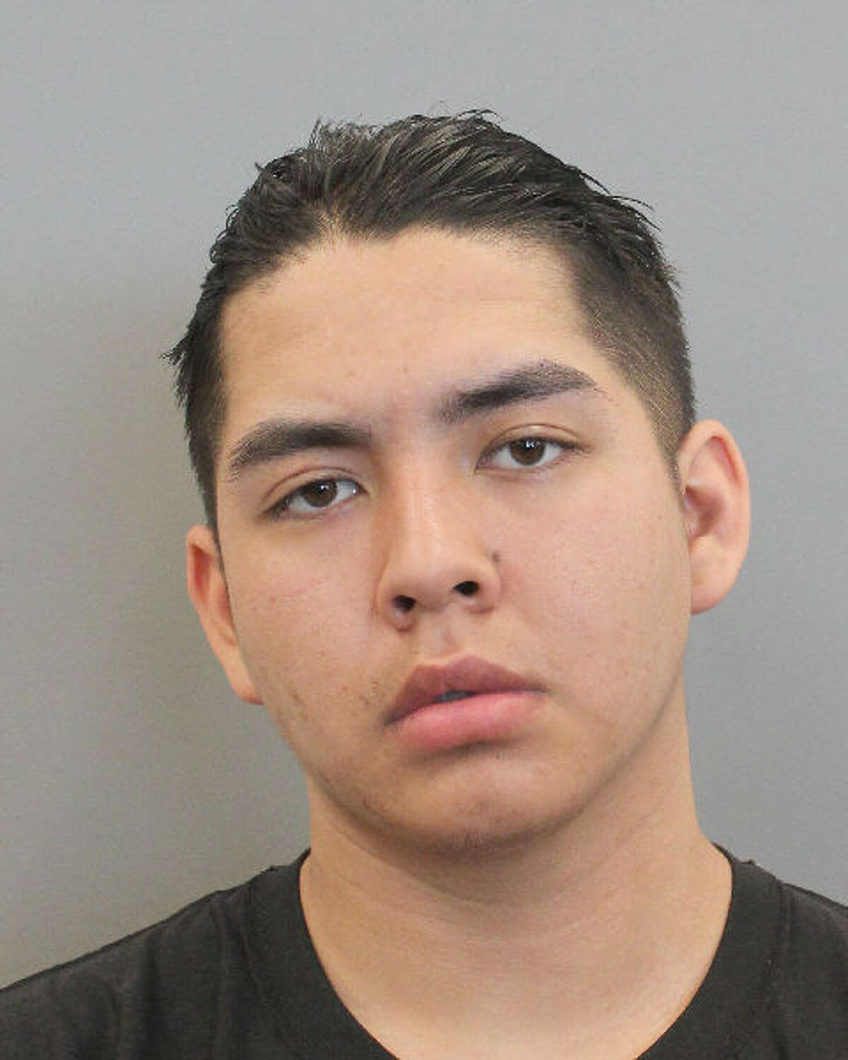 Leroy Lopez, 17, was charged with murder and tampering with evidence in connection to a body found Monday in east Harris County.