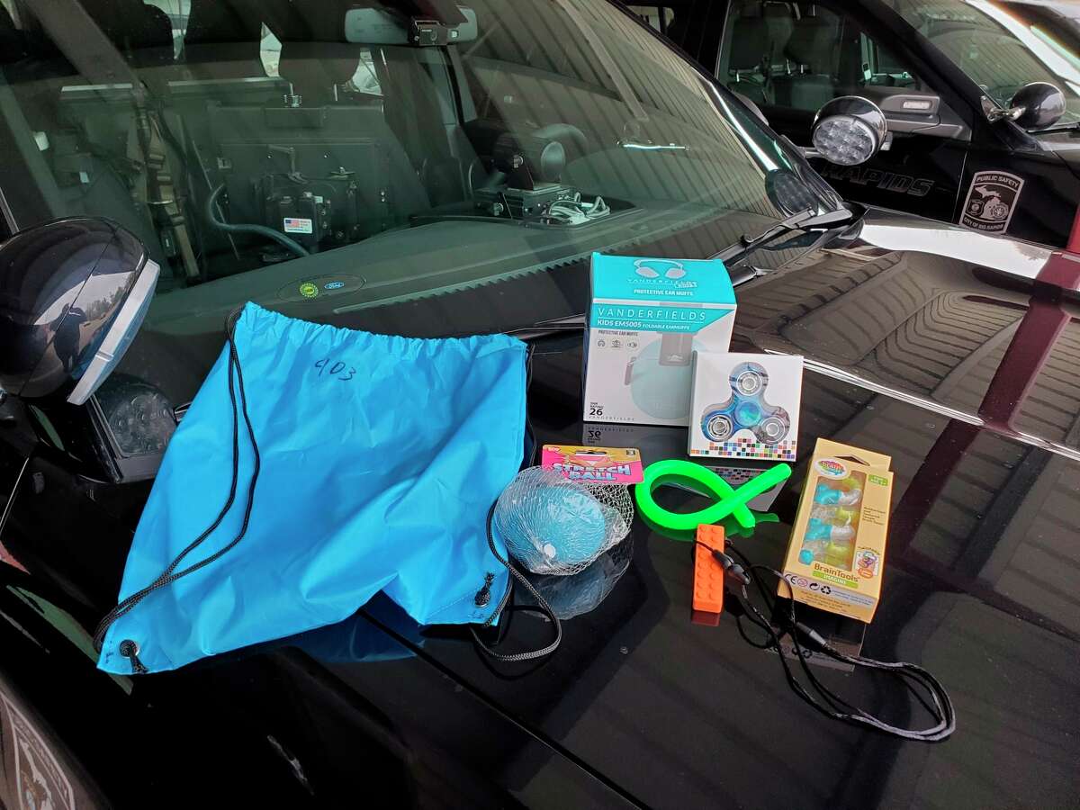 The Big Rapids Department of Public Safety is taking part in Action for Autism to meet the needs of those with autism spectrum disorder. As part of the initiative, each police vehicle will receive a calming bag with earmuffs, fidget spinners and other stress relieving items. (Courtesy photo)