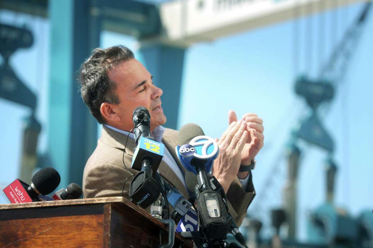 Mayor Joe Ganim speaks at a news conference on the Bridgeport Boatworks property, in Bridgeport, Conn. April 5, 2021. Ganim joined Gov. Ned Lamont and other officials to announce a long-term lease agreement between Bridgeport Boatworks and the Hownblower Group, who run a wide variety of water cruises and ferry services.