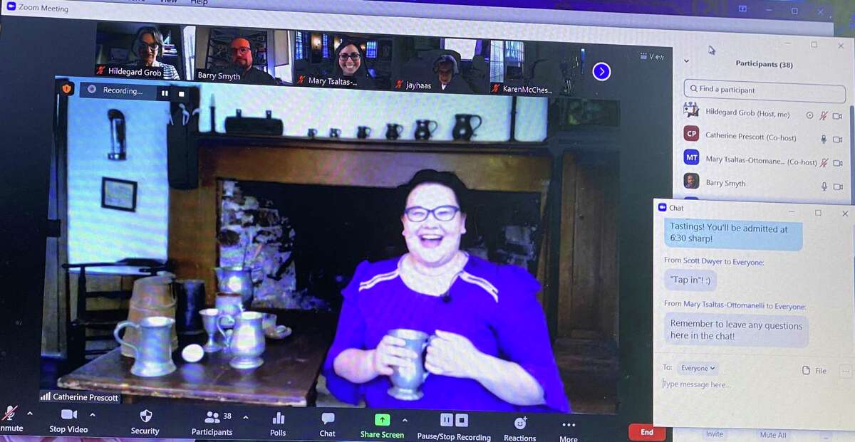 Keeler Tavern Museum's chief curator Catherine Prescott shows a specialty drink enjoyed at Timothy Keeler's tavern in the 18th century during a virtual