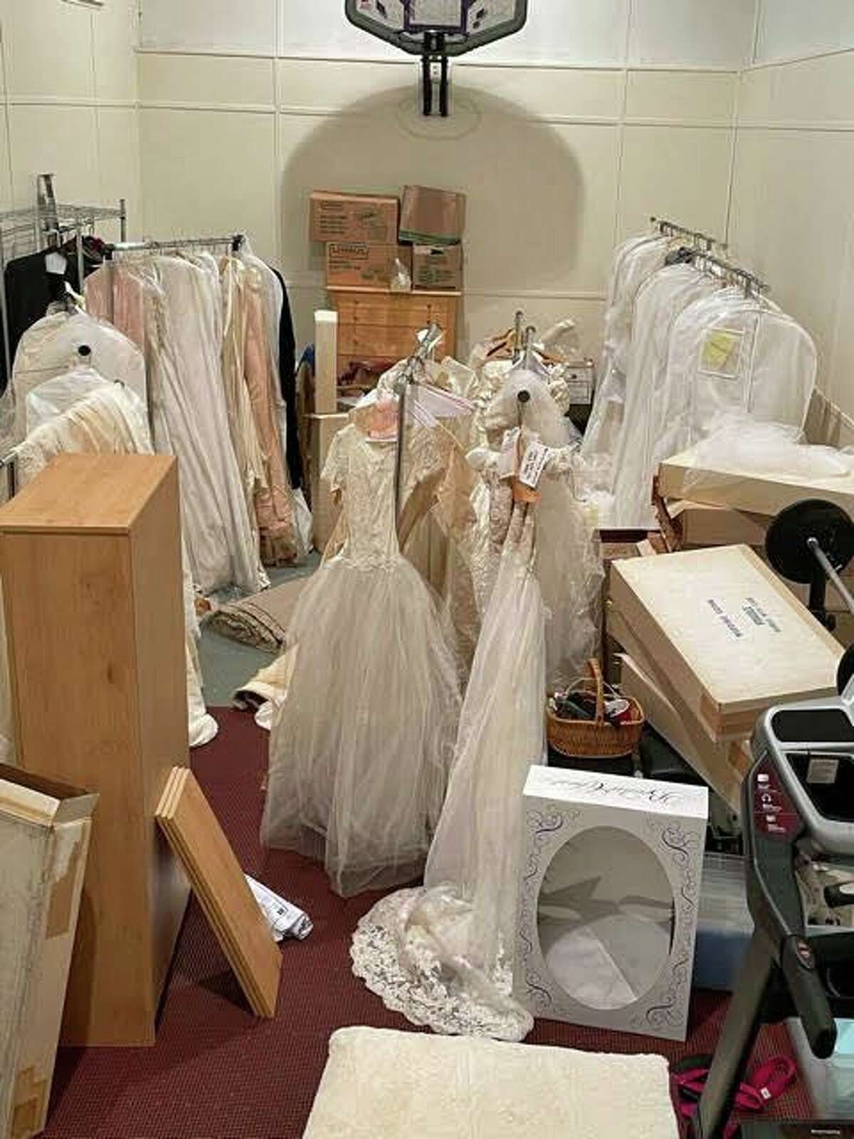 Charles Staley has been storing the wedding dresses from his mother's shop since the building was sold in 2018. He says he keeps them in a special temperature controlled room at his home in Georgia. He is hoping to find the rightful owners of the gowns.