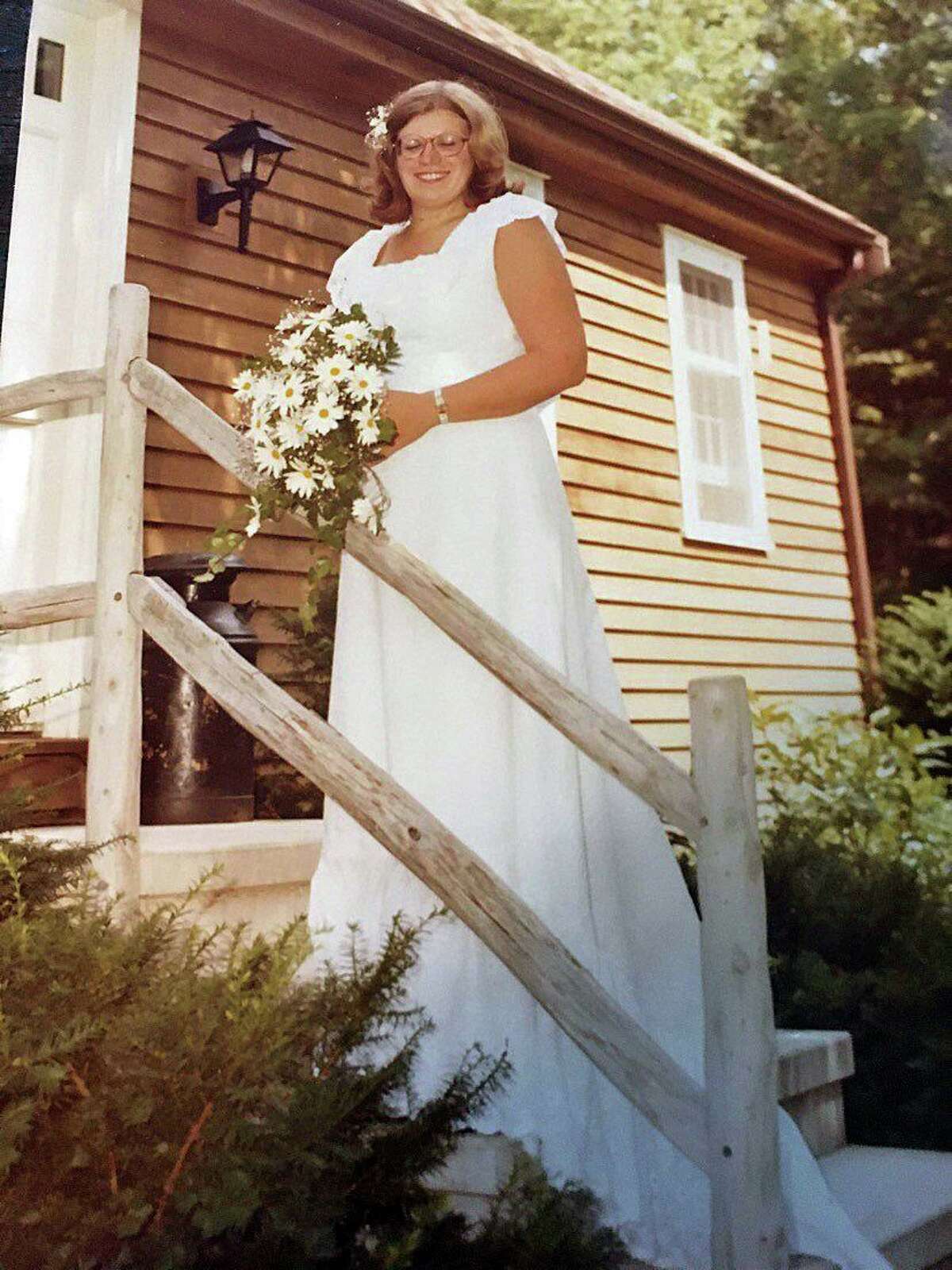 Gail Benson's wedding gown was made by Dorothy Staley in 1978.