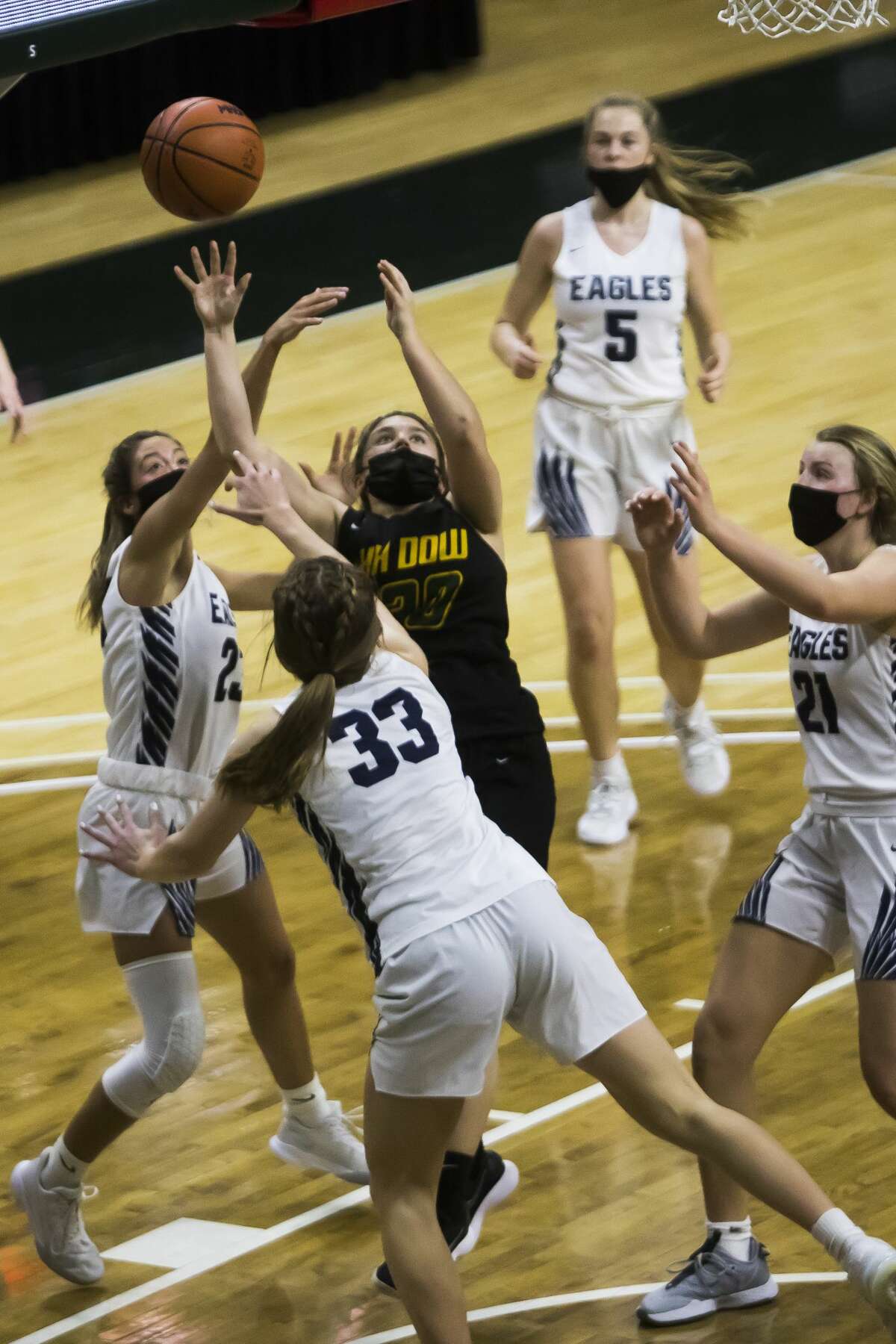 Dow's Kourtney Fischer takes a shot during the Chargers' state semifinal loss to Hudsonville Wednesday, April 7, 2021 at the Breslin Center in East Lansing. (Katy Kildee/kkildee@mdn.net)