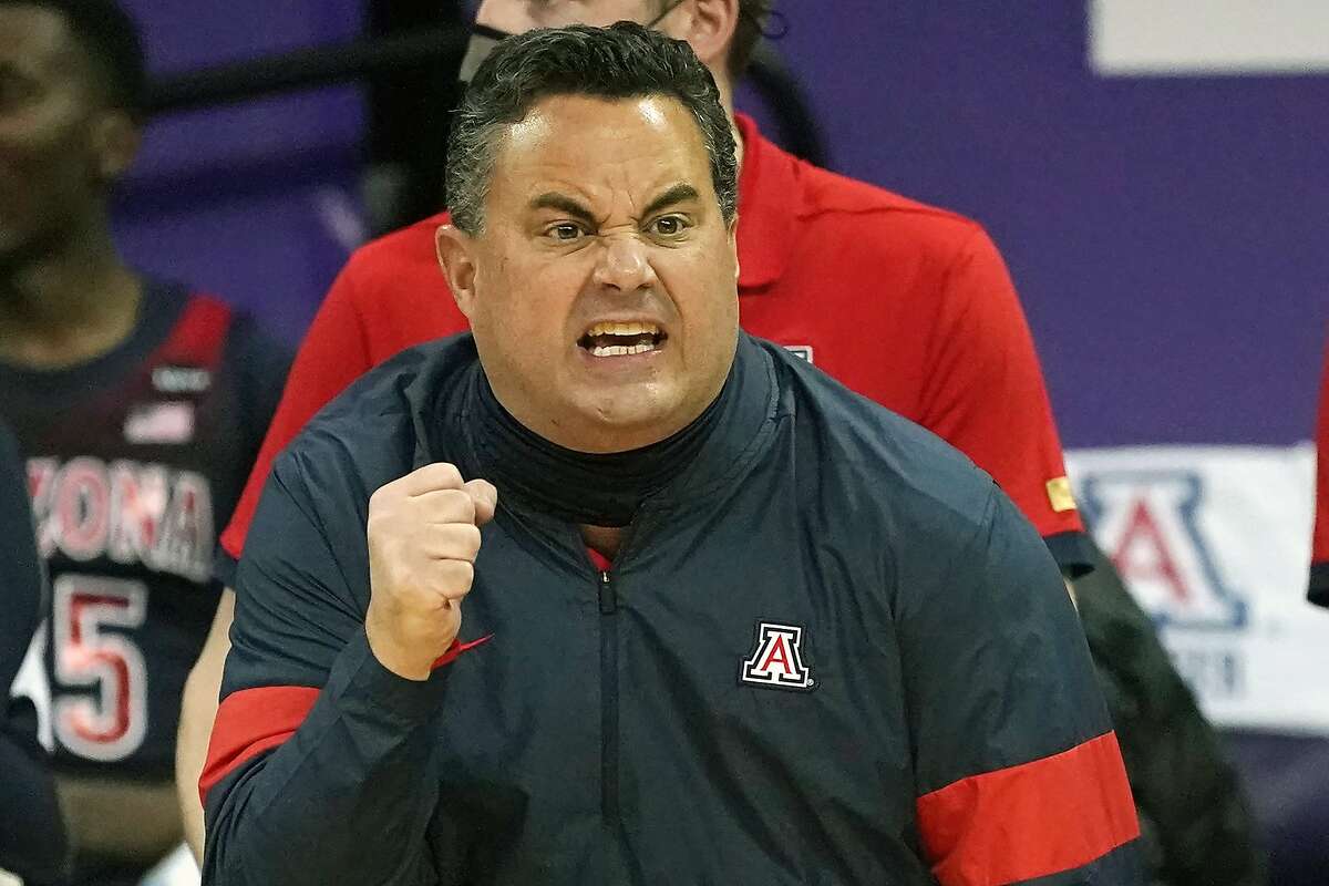 FILE - Arizona head coach Sean Miller motions toward the court in the first half of an NCAA college basketball game against Washington in Seattle, in this Thursday, Dec. 31, 2020, file photo. Arizona has parted ways with men's basketball coach Sean Miller as the program awaits its fate in an NCAA infractions investigation, a person with knowledge of the situation told The Associated Press. The person told the AP on condition of anonymity Wednesday, April 7, 2021, because no official announcement has been made. (AP Photo/Elaine Thompson, File)