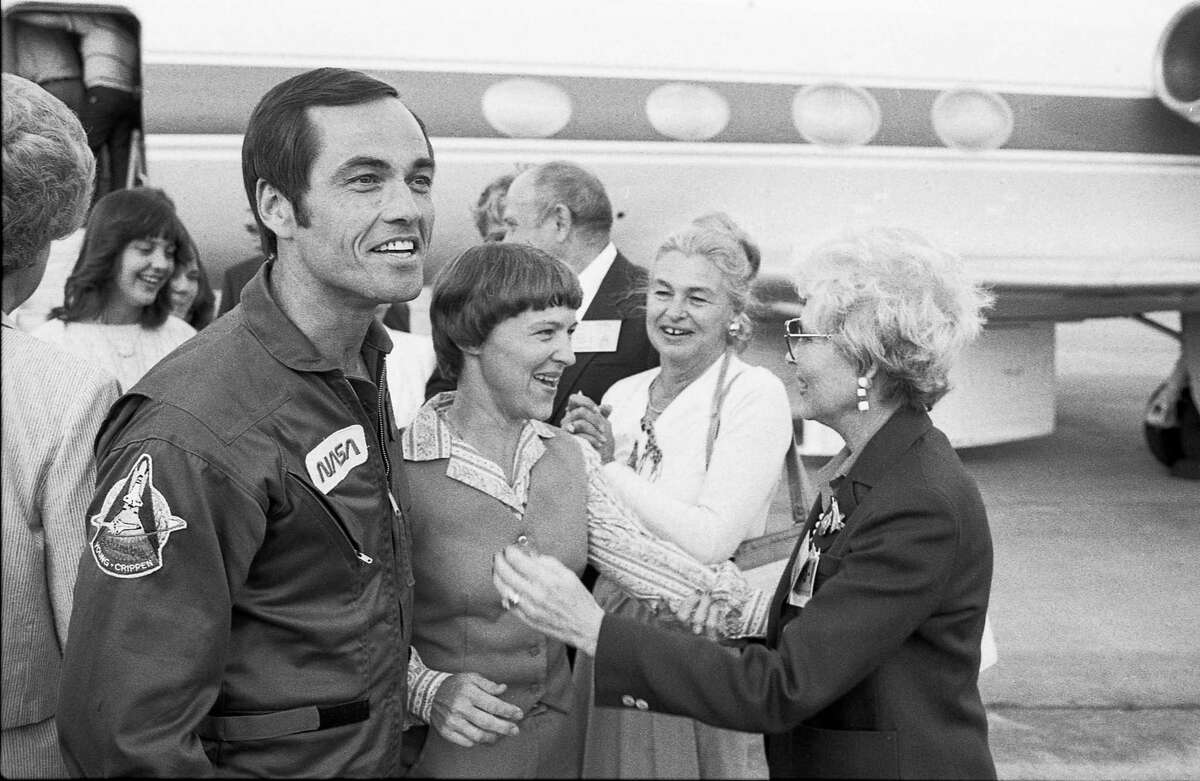 Space shuttle mission STS-1 astronaut Bob Crippen is greeted by well-wishers at Ellington AFB ceremonies for his and John Young's return to Houston following their space shuttle landing at Edwards AFB in California in April 1981.