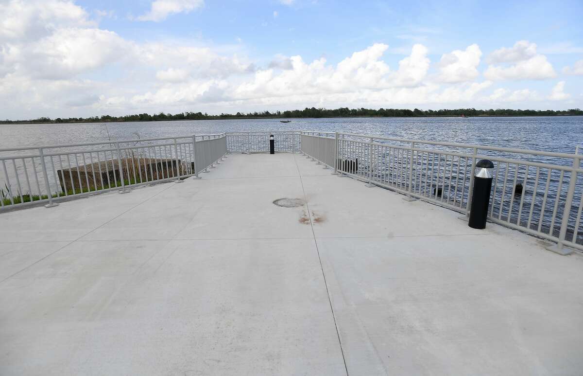 A portion of the new riverfront walkway in Port Neches Riverfront Park is completed, with additional work, connecting it to a housing development, still underway. Photo made Tuesday, April 6, 2021 Kim Brent/The Enterprise