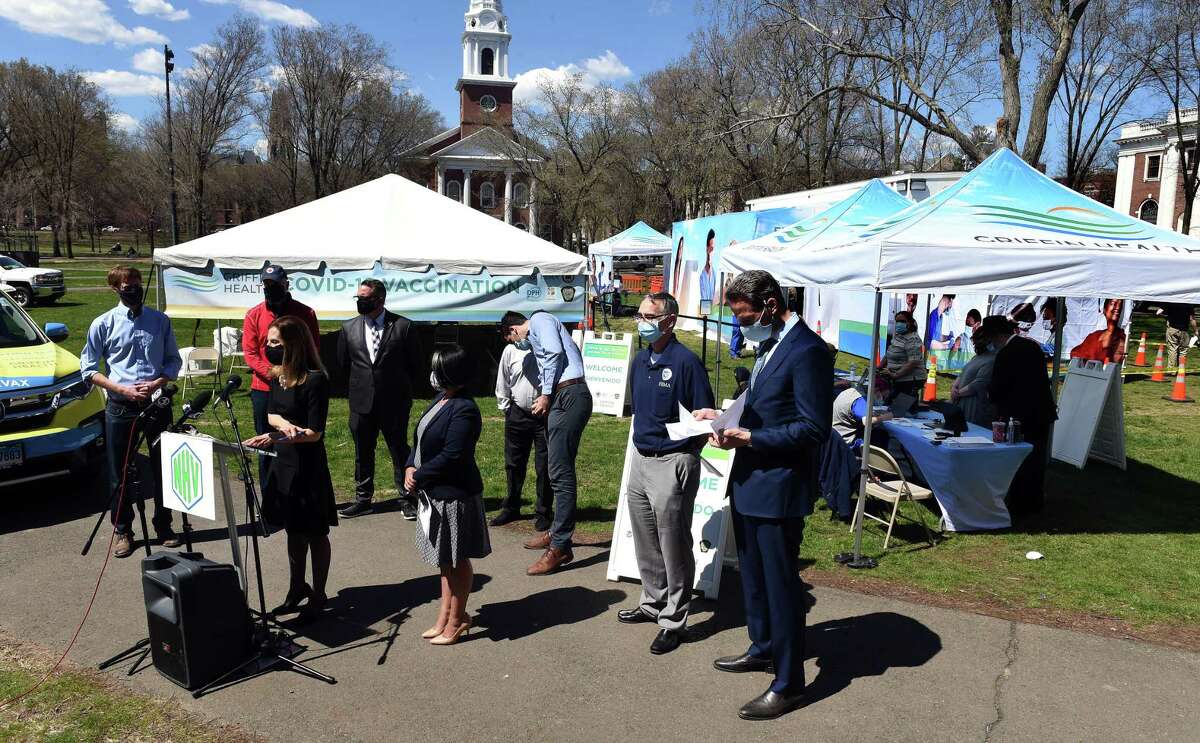 Lt. Gov. Susan Bysiewicz (left) speaks at a press conference at the site of a COVID-19 FEMA Mobile Vaccination Unit on the New Haven Green on April 8, 2021.