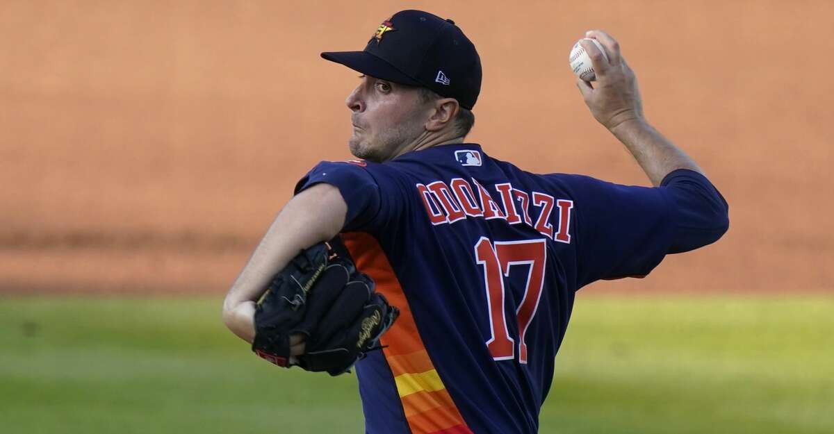 Houston Astros starting pitcher Jake Odorizzi throws during the first inning of a spring training baseball game against the Washington Nationals, Wednesday, March 24, 2021, in West Palm Beach, Fla. (AP Photo/Lynne Sladky)