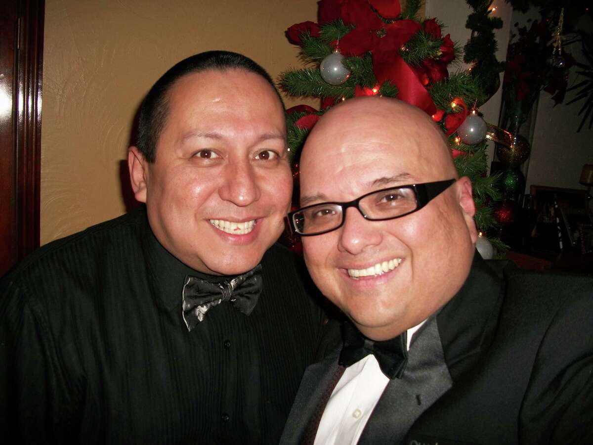 Greg Hinojosa (right) produced the Fiesta Frenzy fundraiser with his husband Daniel Acosta.
