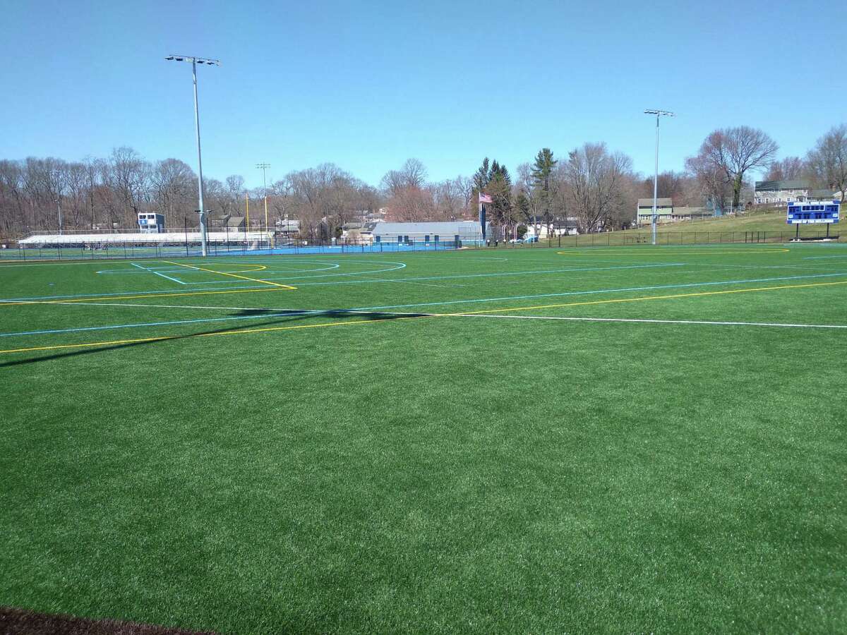 A view of the new artificial-surface multipurpose field, also the baseball outfield at Bunnell High School in Stratford, Conn., on April 6, 2021. The baseball scoreboard is new, as is LED lighting. The stadium, seen in the back left, also received a new surface and a new track in a separate project.