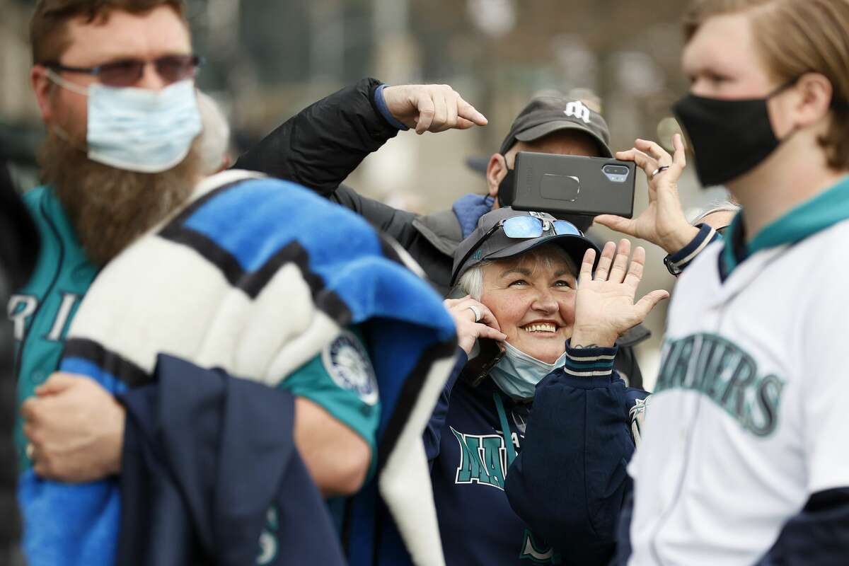 SEATTLE, WASHINGTON - APRIL 01: Fans wait outside before Opening Day between the Seattle Mariners and the San Francisco Giants at T-Mobile Park on April 01, 2021 in Seattle, Washington. (Photo by Steph Chambers/Getty Images)