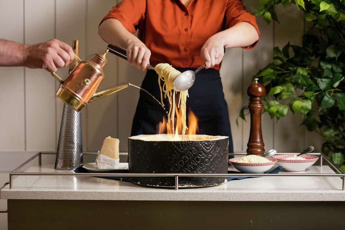 Caputo Trattoria's tableside cacio e pepe presentation (currently on pause because of COVID-19) features Pecorino Romano, Parmigiano Reggiano and fresh black pepper.