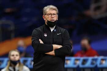 SAN ANTONIO, TEXAS - APRIL 02: Head coach Geno Auriemma of the UConn Huskies looks on against the Arizona Wildcats during the second quarter in the Final Four semifinal game of the 2021 NCAA Women's Basketball Tournament at the Alamodome on April 02, 2021 in San Antonio, Texas. (Photo by Elsa/Getty Images)