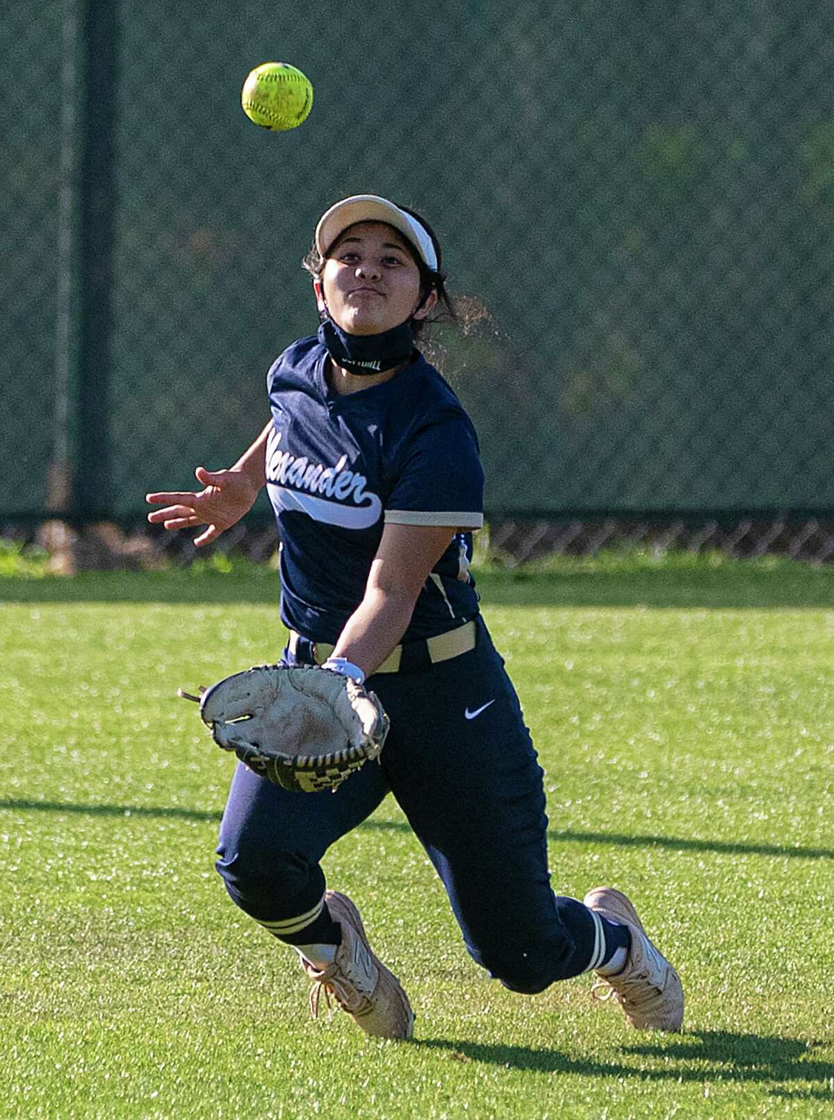 Magali Herrera reaches for an out Friday during Alexander’s 22-8 win over United South at the SAC.