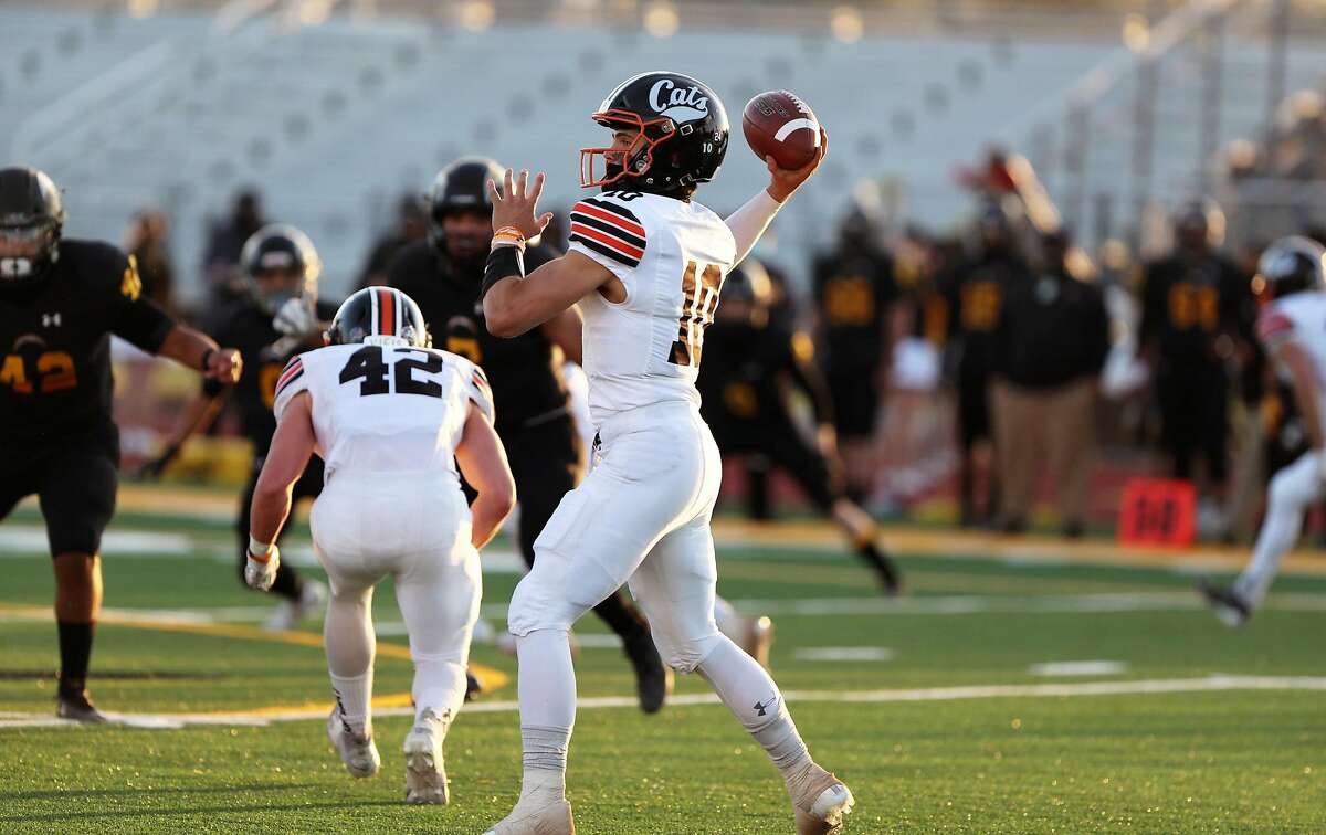 High school football: Los Gatos senior Adam Garwood carries ball