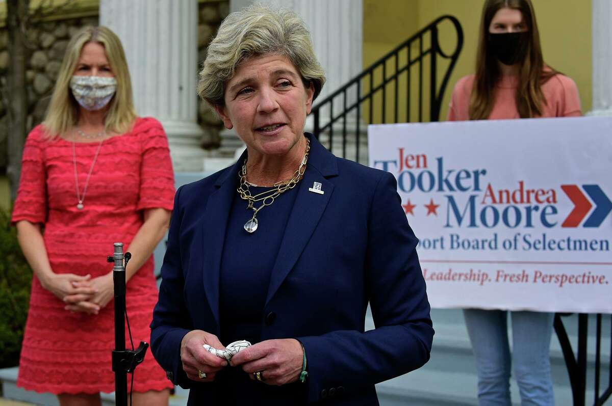 Westport's Second Selectwoman Jen Tooker announces her candidacy for first selectman her running mate Andrea Moore Friday April 9, 2021, in front of Town Hall in Westport, Conn. Tooker makes her announcement several days after Jim Marpe said he would not seek reelection as first selectman.