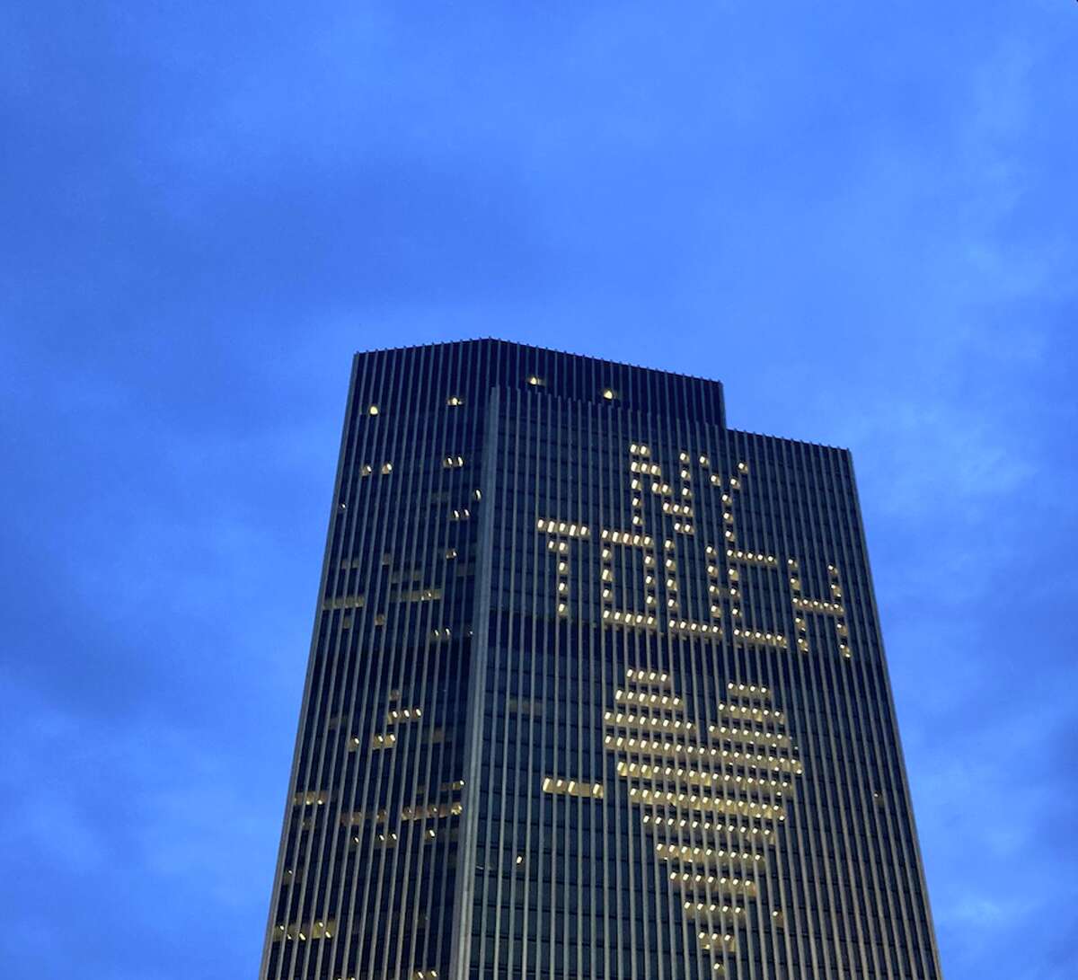 A light display on the Corning Tower that normally reads "NY TOUGH" instead read "NY TOUCH" on Friday night.