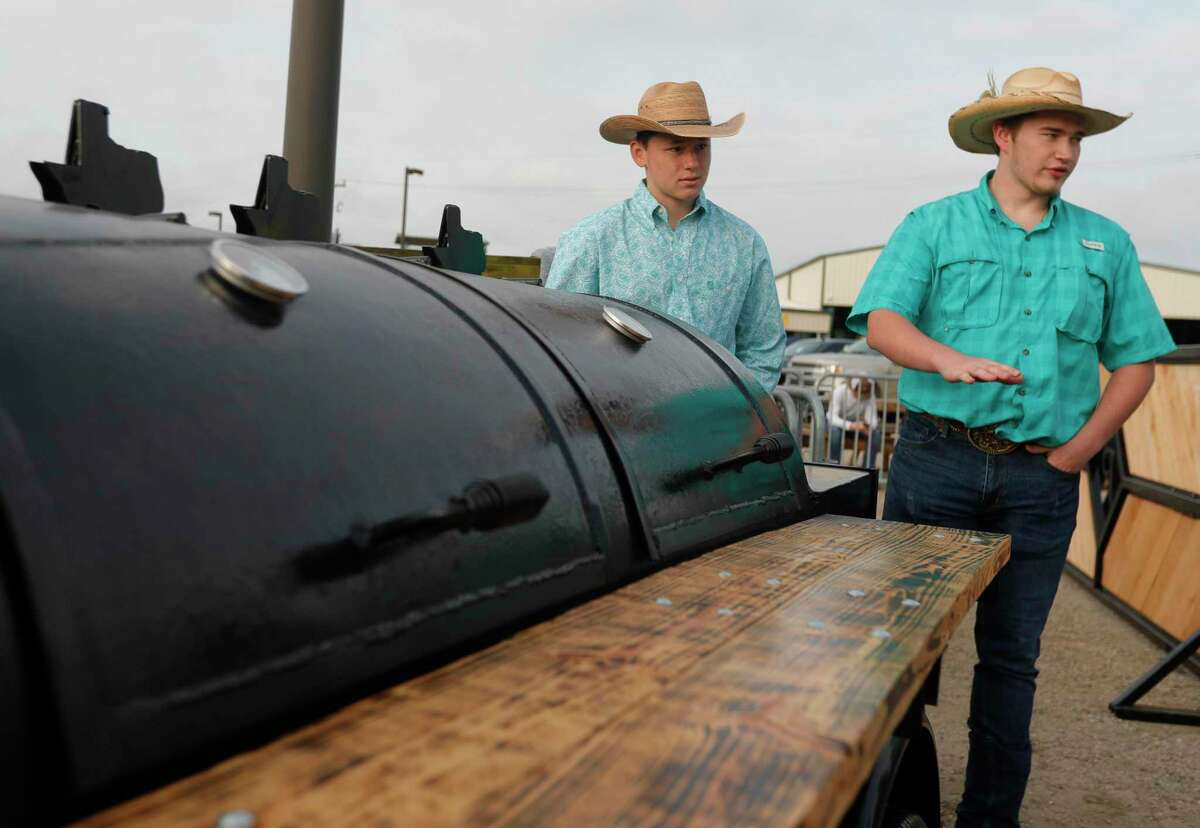 Zachary Jennings talks about his team’s grill to the ag competition judges during the Montgomery County Fair and Rodeo, Saturday, April 10, 2021, in Conroe. Ag Mechanics prepares students for careers related to the construction, operation, and maintenance of equipment used by the agriculture industry.