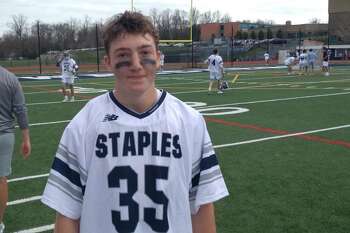 Goalie J.P. Kosakowski helped Staples to a 7-3 boys lacrosse win over New Canaan on Saturday in Westport.