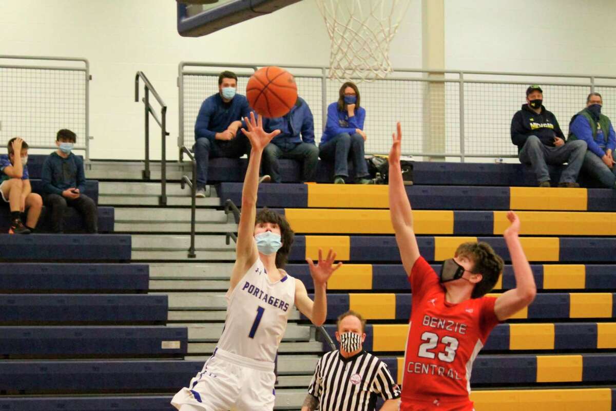 John Burtch scores a layup against Benzie Central on March 11. (News Advocate file photo)