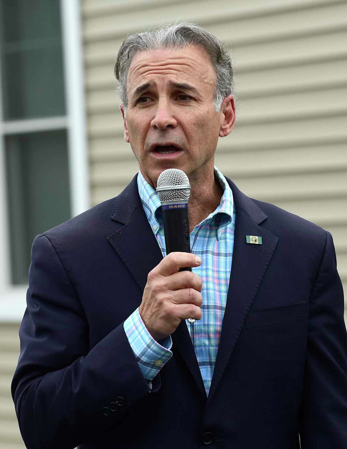 Former First Selectman Fred Camillo speak at a Greenwich Communities plaque dedication at its Armstrong Court affordable housing apartment complex on Saturday, April 10, 2021, in Greenwich, Conn.