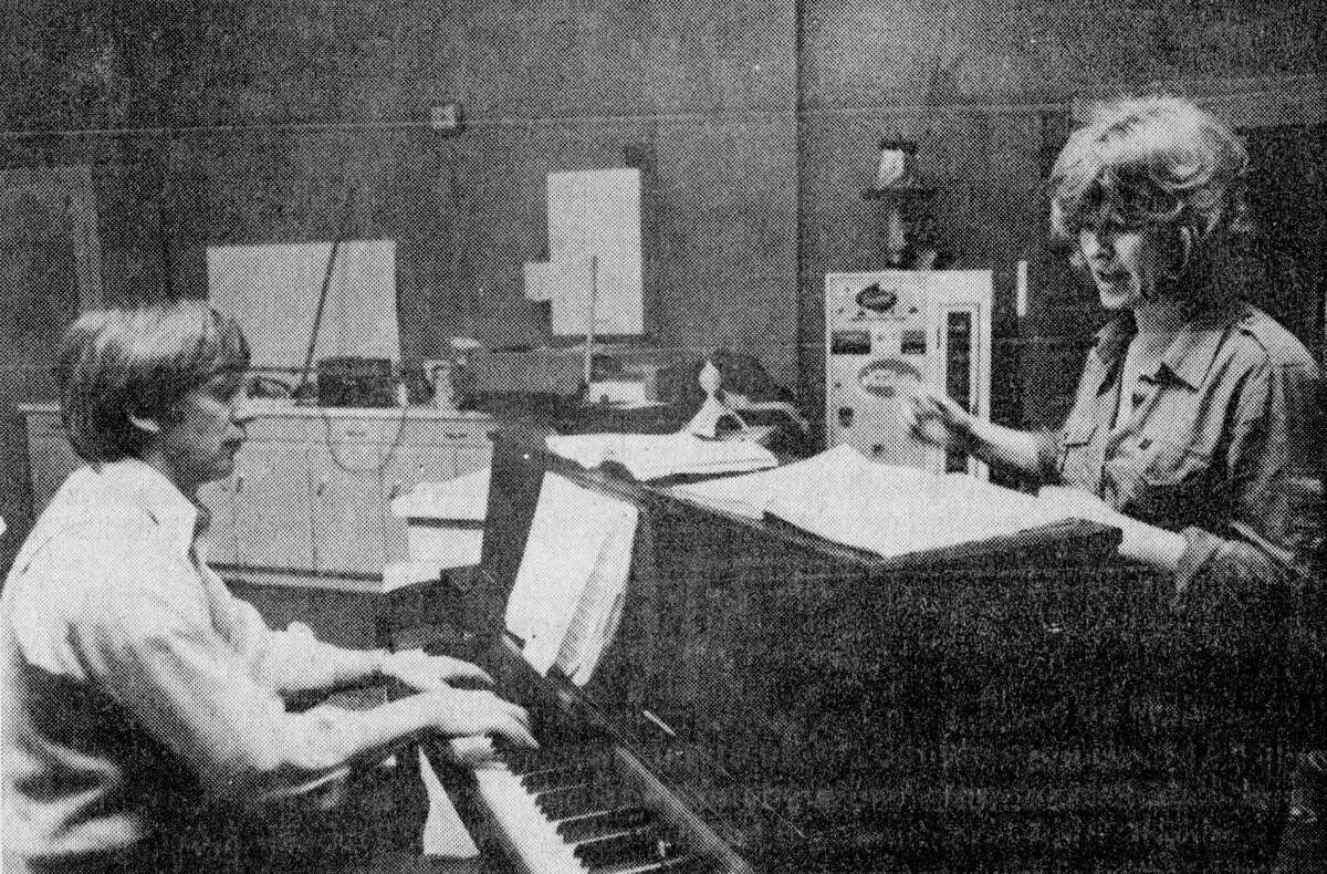 Merton Youngberg and Kay Hickey get together on the score for "Fiddler on the Roof," the Manistee Civic Players production to be presented at the Ramsdell Theatre beginning April 23. Youngberg is the play's pianist and Hickey the musical director. The photo was published in the News Advocate in early April 1981. (Manistee County Historical Museum photo)