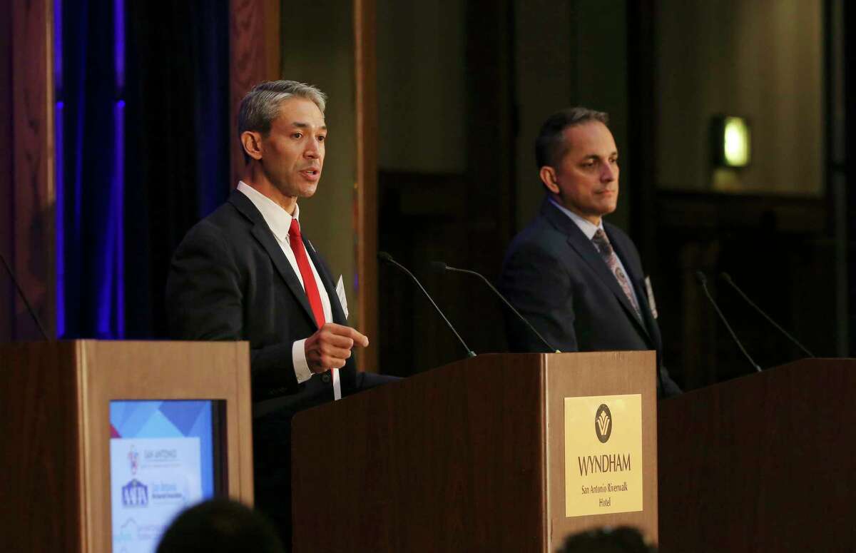 San Antonio Mayor Ron Nirenberg, left, answers a question during a mayoral debate with then-City Councilman Greg Brockhouse, right, hosted by Visit San Antonio at the Wyndham Riverwalk, Wednesday, April 3, 2019.