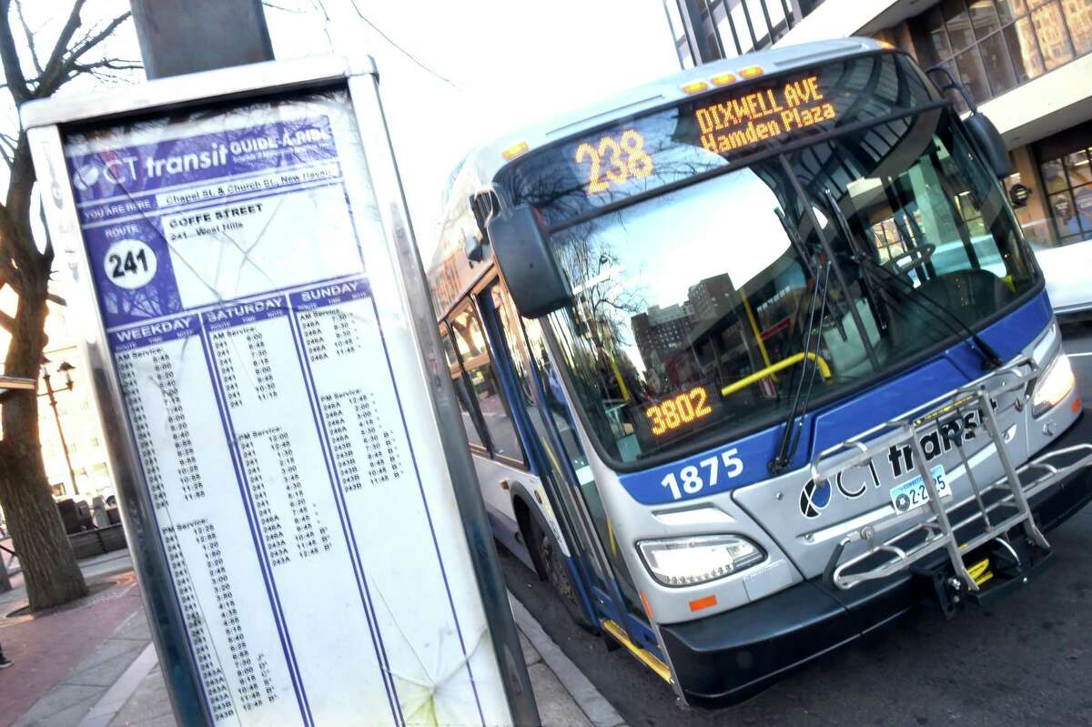 A CT Transit bus waits to depart from a bus stop on Chapel Street in New Haven on November 21, 2019.  The State Department of Transportation said improving bus traffic in New Haven, Stamford and Bridgeport and replacing CTTransit buses with electric vehicles were priority projects for federal funding under President Joe Biden's proposed infrastructure bill.