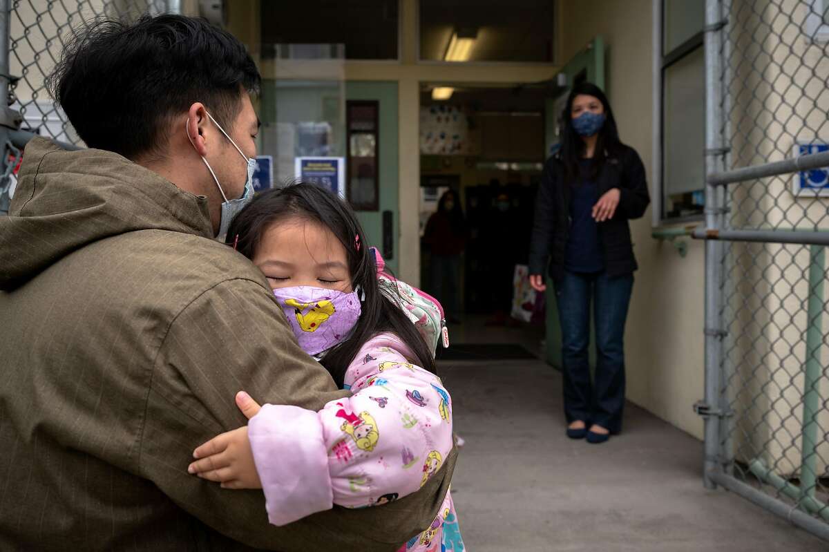 William Luong sees off daughter Evelyn, 4, before her first day at Jefferson Early Education School in the Sunset.
