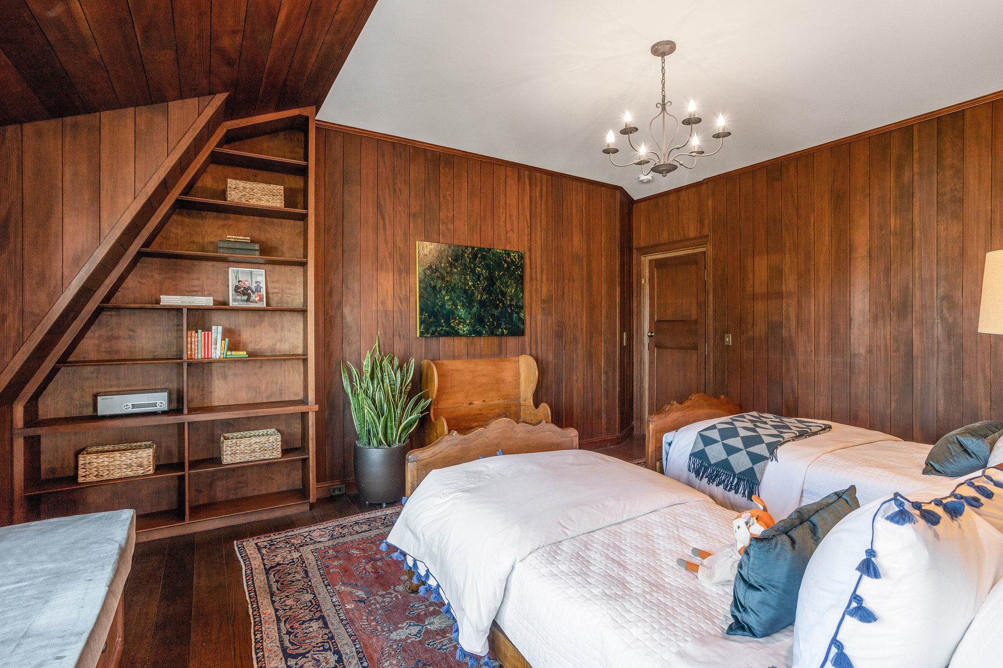 Another built-in bookcase shows Coxhead's whimsy.