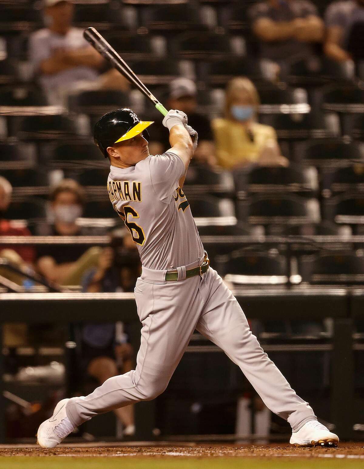 PHOENIX, ARIZONA - APRIL 12: Matt Chapman #26 of the Oakland Athletics hits a solo home run against the Arizona Diamondbacks during the fifth inning of the MLB game at Chase Field on April 12, 2021 in Phoenix, Arizona. (Photo by Christian Petersen/Getty Images)