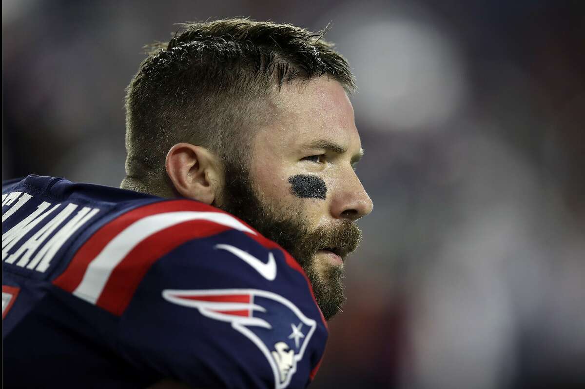 FILE - In this Oct. 4, 2018, file photo, New England Patriots wide receiver Julian Edelman warms up before an NFL football game between against the Indianapolis Colts in Foxborough, Mass. Citing a knee injury that cut his 2020 season short after just six games, Edelman announced Monday, April 12, 2021, that he is retiring from the NFL after 11 seasons. (AP Photo/Charles Krupa, File)