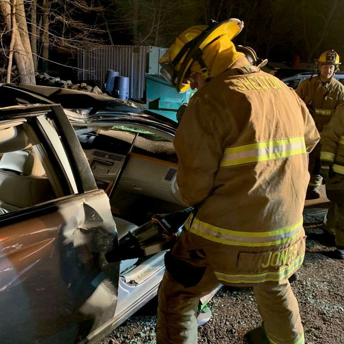 Shelton firefighters practice vehicle extrication techniques prior to the evaluation of their skills by the Connecticut Fire Academy in April 2021.