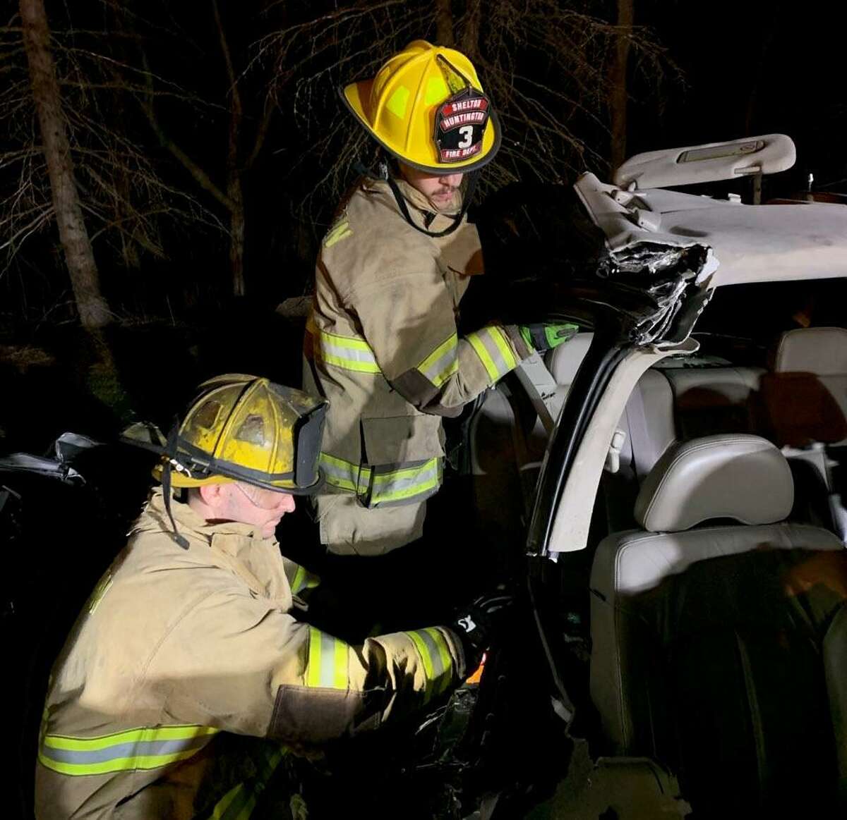 Shelton firefighters practice vehicle extrication techniques prior to the evaluation of their skills in this area by the Connecticut Fire Academy.