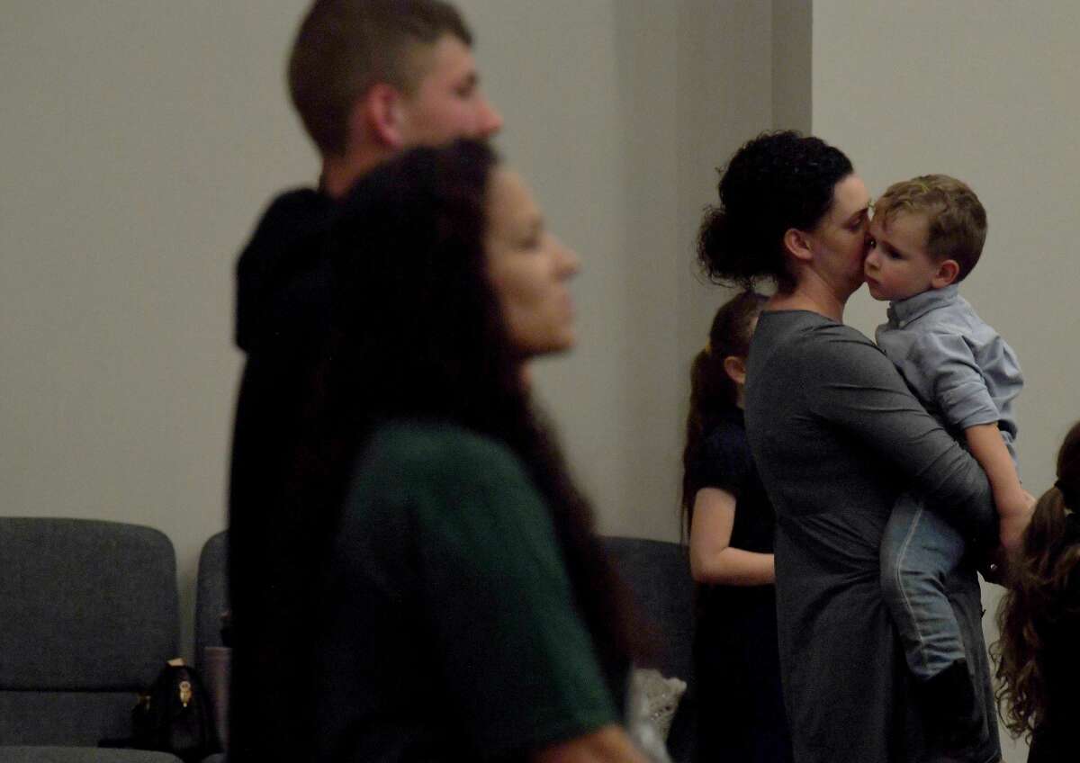 Attendees join in a prayer vigil for Orange County Sheriff's officers Dru Crochet and Scott Barnes and Orange City Policeman Howard DeVault at Eastgate United Pentecostal Church in Vidor Monday. The three officers are battling serious illesses, prompting the community to rally together in prayers and support. The event included altar calls for any in need of healing at its finale. Photo made Monday, April 12, 2021 Kim Brent/The Enterprise