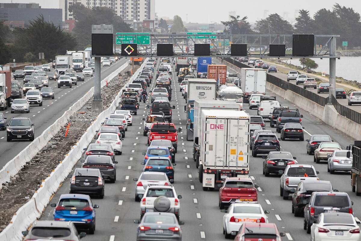 Morning commuter traffic backs up on Interstate 80 westbound in Berkeley, Calif. Tuesday, April 6, 2021. A third of Bay Area residents plan to commute less after the pandemic, but most of the drop in demand will be non-car transit.