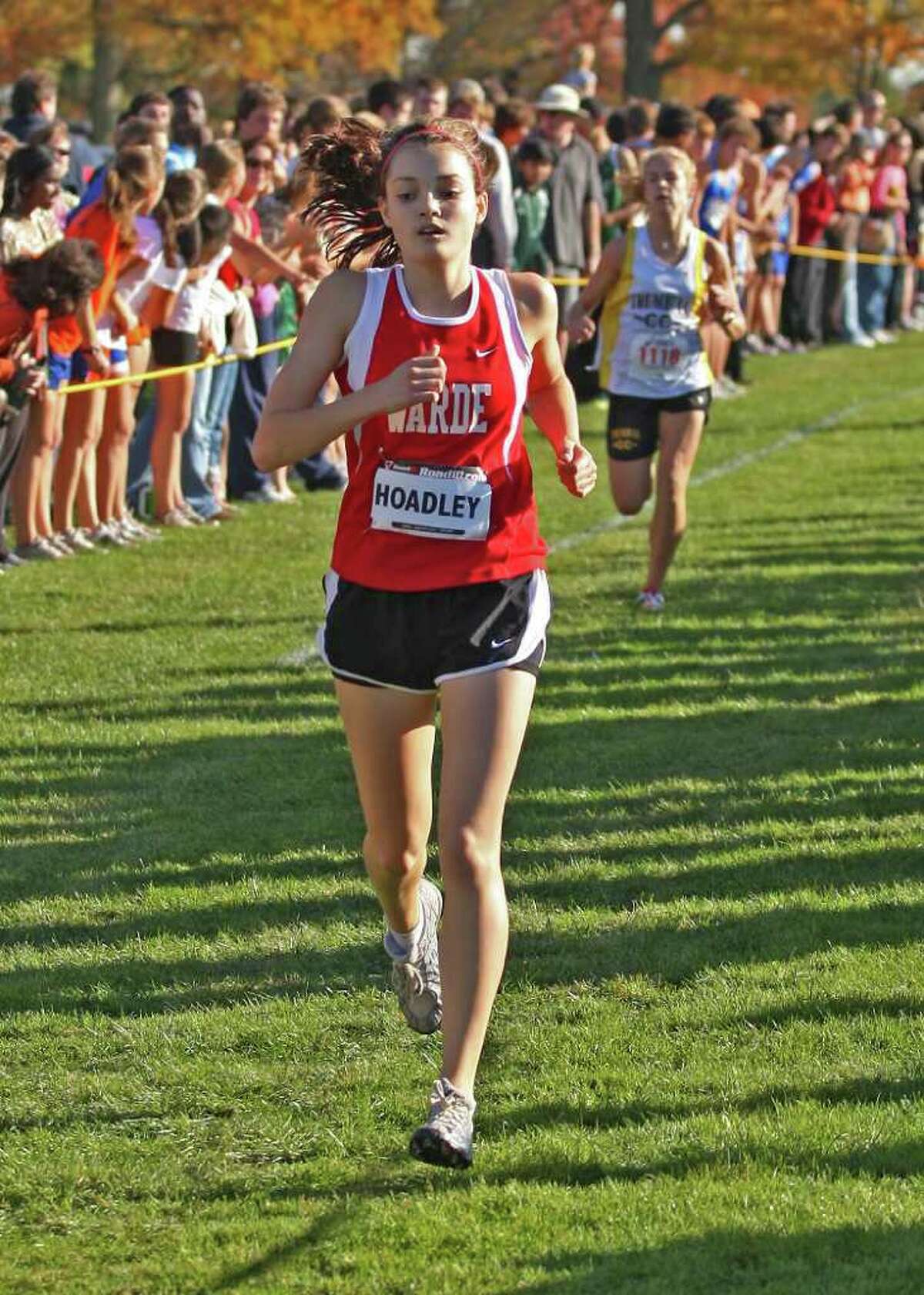 Fairfield Warde's Lexi Hoadley crosses the finish line during a race during the 2009 season. Hoadley should be the Mustangs' top female returning runner this year.