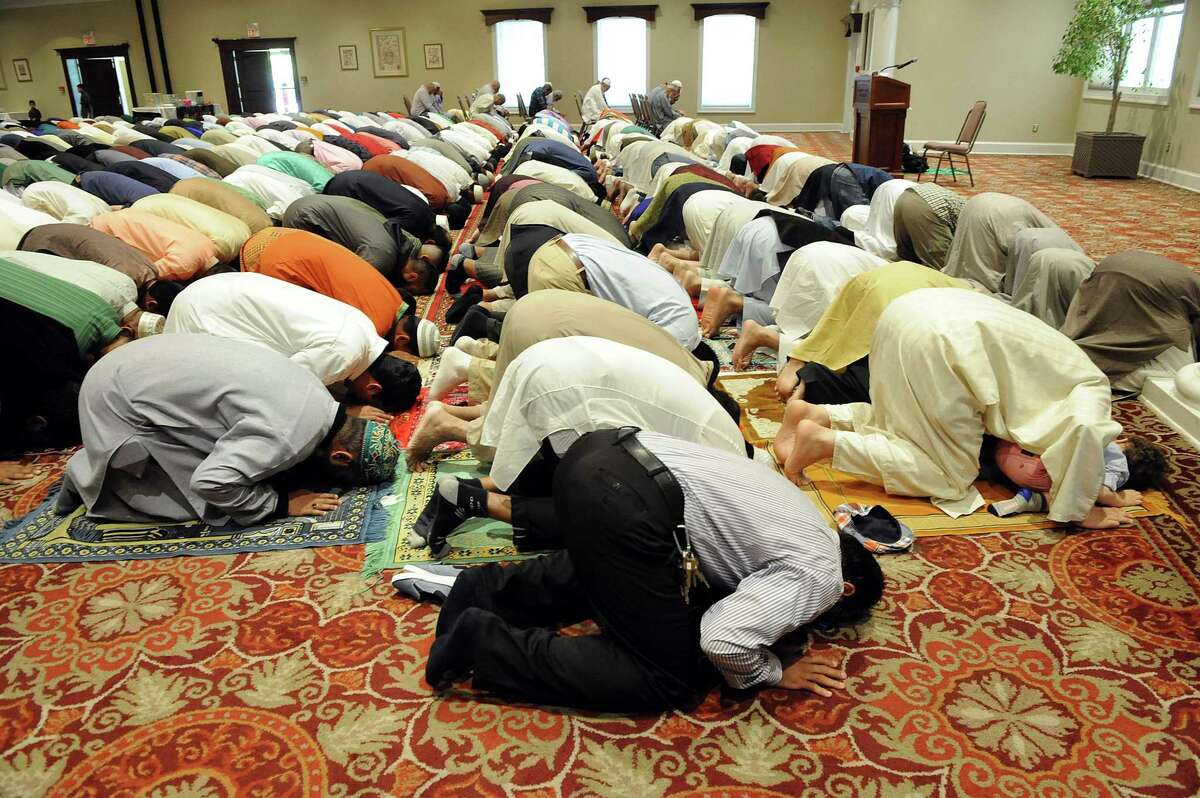 The Muslim community in greater Danbury joined together for an Eid prayer service to celebrate the end of Ramadan, Wednesday, July 6, 2016, held at the Amber Room in Danbury.
