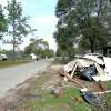 While the post-Harvey clean-up piles have diminished in number and scope, often they have been replaced simply by smaller piles, broken bits of debris, and the ashy remains of gutted interiors. In hard hit regions, like Rose Hill Acres, subdivisions bear the lingering smell of mold as residents continue the process of rebuilding, many taking temporary shelter in campers parked outside their homes. Photo taken Thursday, November 2, 2017 Kim Brent/The Enterprise