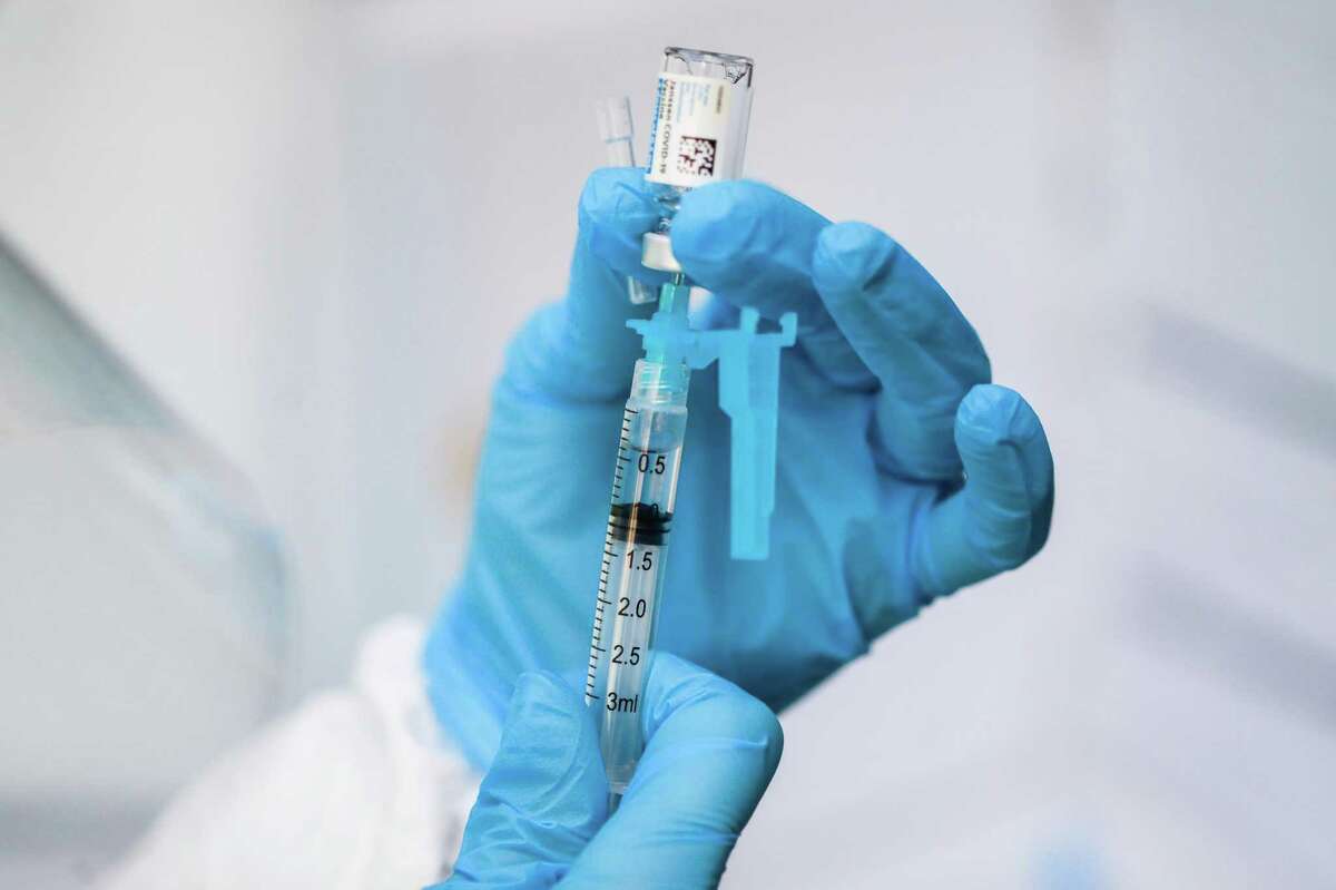 A nurse prepares a syringe with the Johnson & Johnson COVID-19 vaccine in Oakland last month.