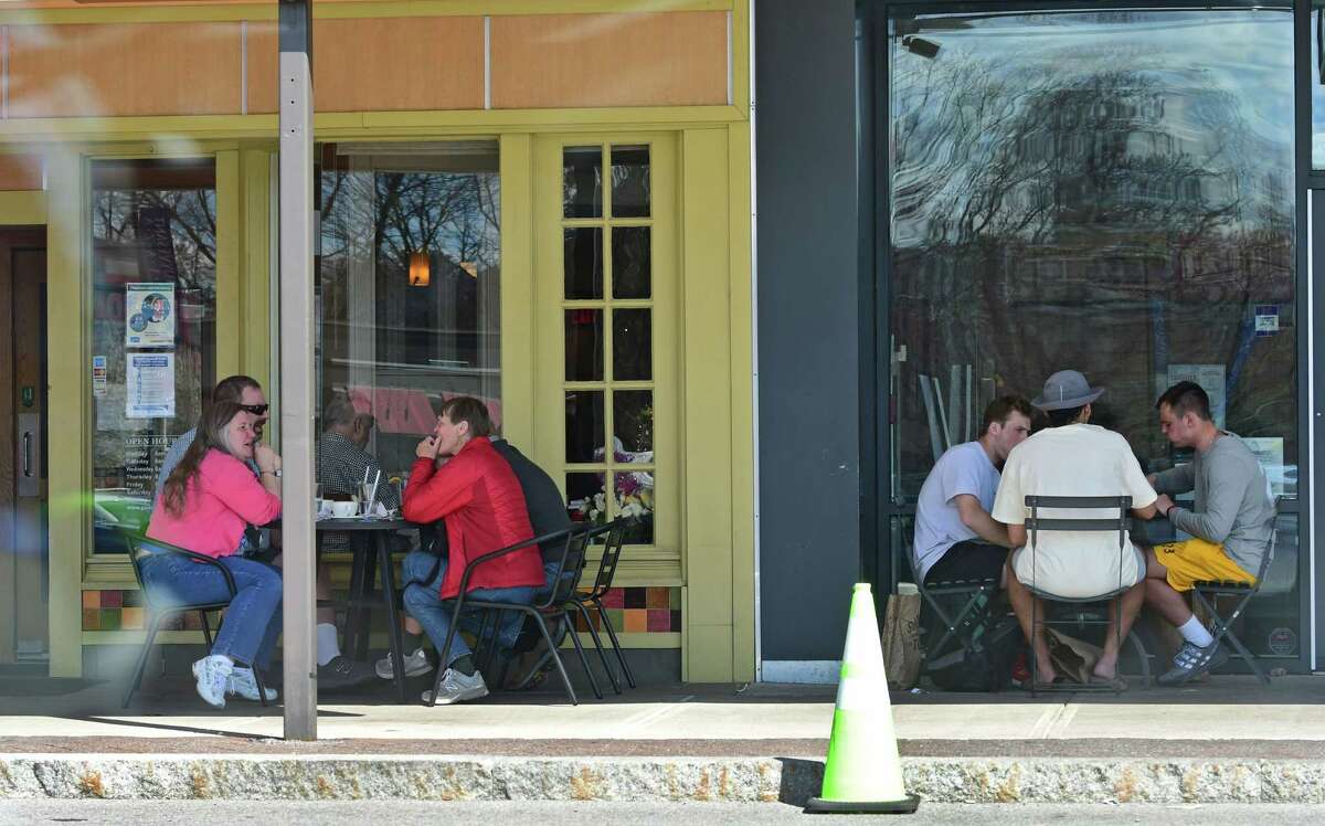 People dine al fresco at restaurants in Stuyvesant Plaza on Tuesday, April 13, 2021 in Albany, N.Y. (Lori Van Buren/Times Union) ORG XMIT: ALB2104131449230013