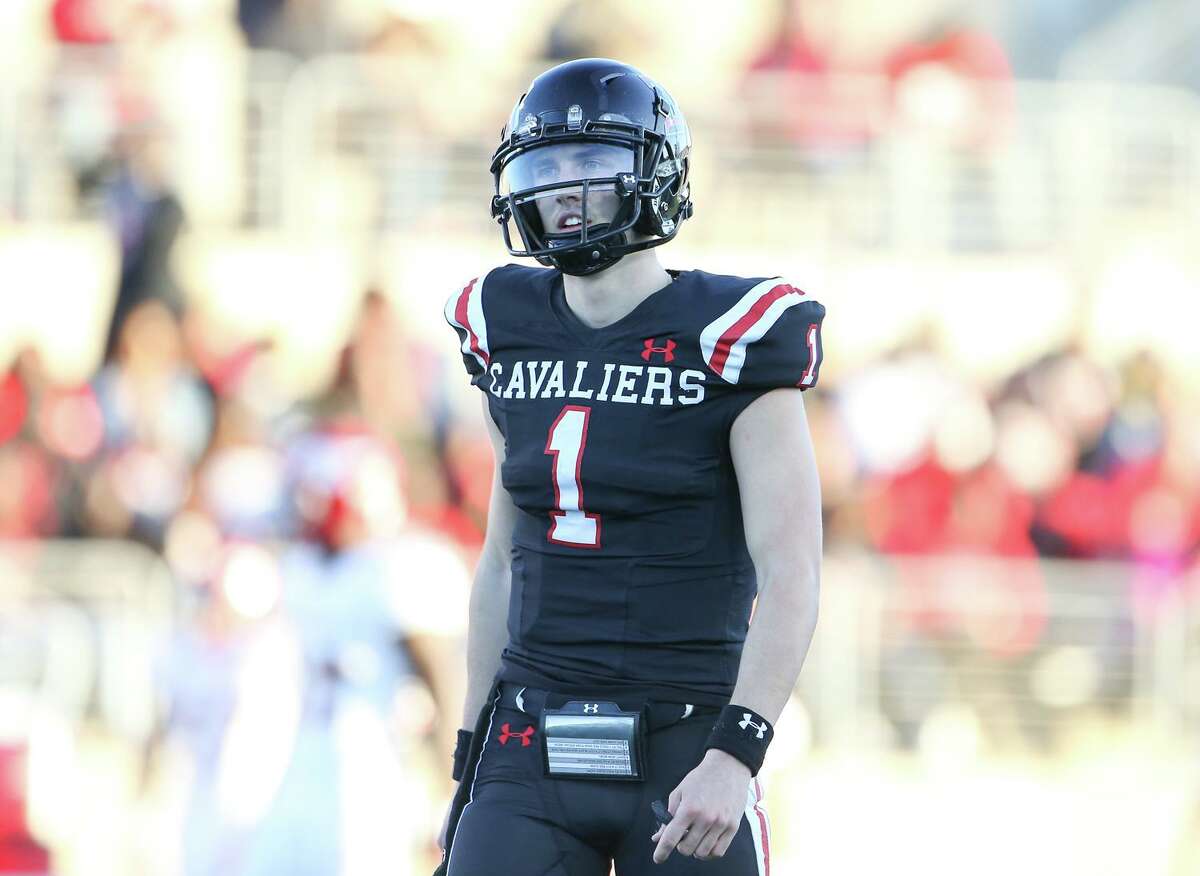 Lake Travis Cavaliers quarterback Hudson Card (1) reacts after throwing an incomplete pass on third down during the first half of a high school state semifinal football game, Saturday, Dec. 14, 2019, in Round Rock, TX.