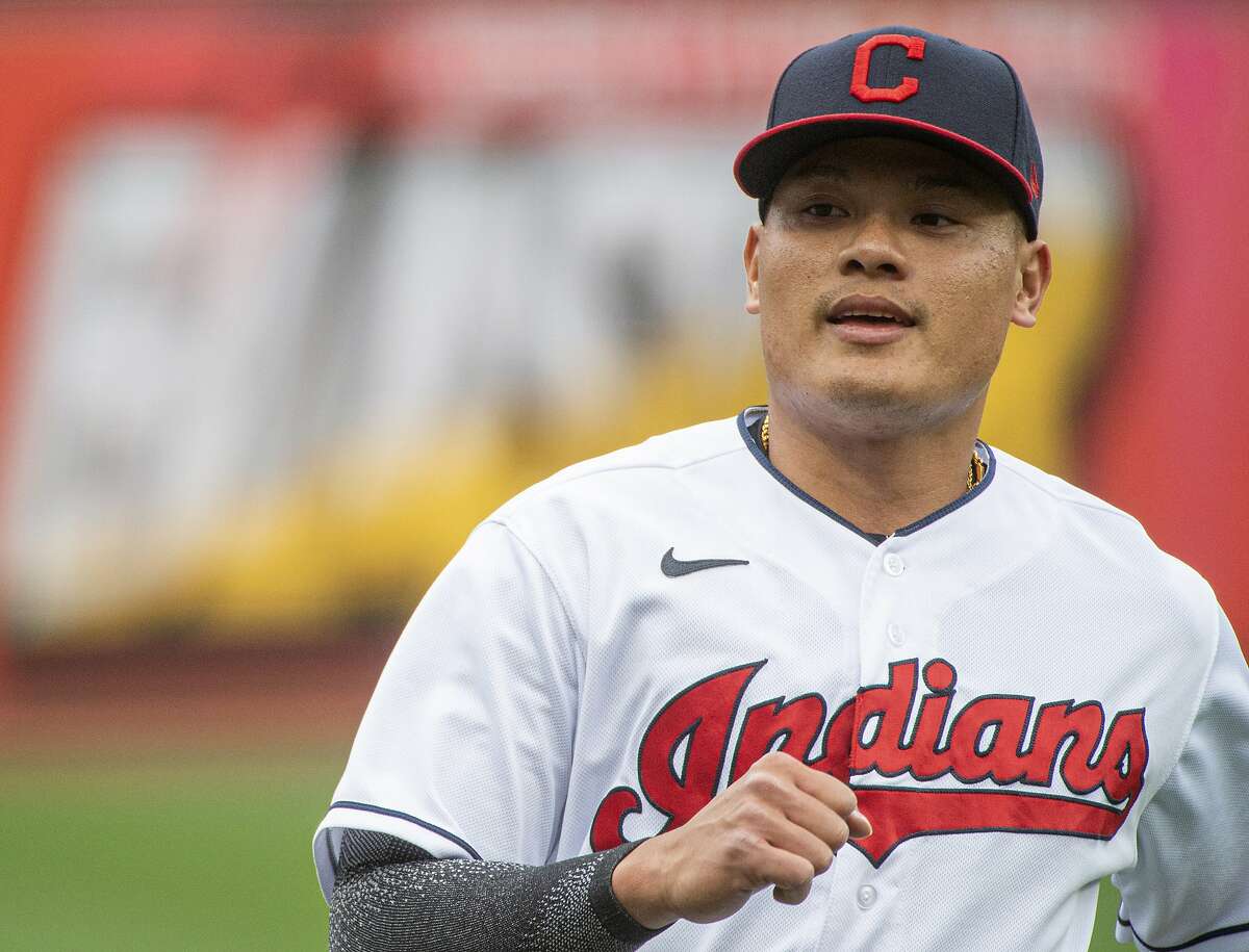 Cleveland Indians' Yu Chang warms up before a baseball game against the Detroit Tigers in Cleveland, Saturday, April 10, 2021. (AP Photo/Phil Long)