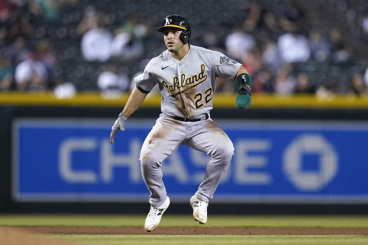 Oakland Athletics' Ramon Laureano takes a lead off from second base during the seventh inning of a baseball game against the Arizona Diamondbacks Monday, April 12, 2021, in Phoenix. (AP Photo/Ross D. Franklin)